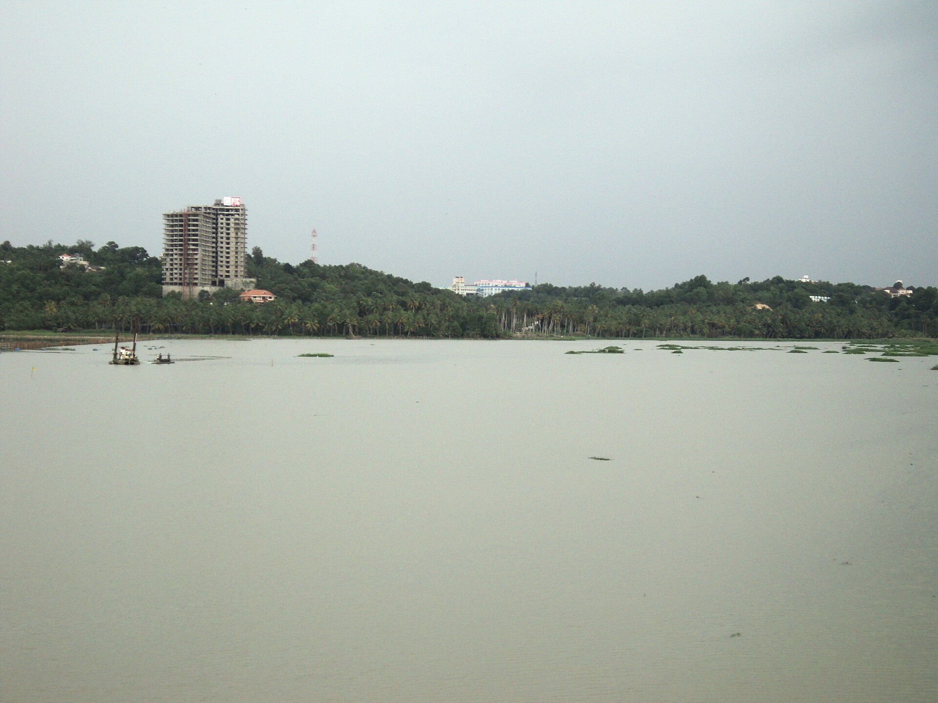 Akkulam Lake under monsoon skies. Boating is open on clear days.